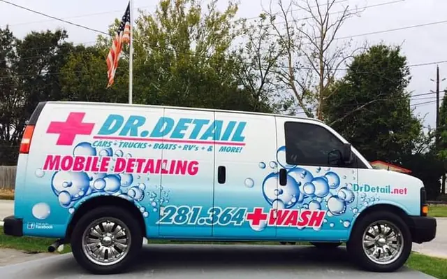 The Dr. Detail mobile detailing van, red cross mark and 281-364-WASH on the side